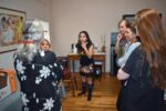 Carrie Diamond, Jaime Fior, Susan Manchak, Marie Pochitaloff, and Addy Baney receive instructions from Chef Clau